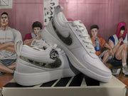 Nike White Low-Top Sneakers with Patterned Swoosh