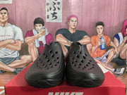 Nike Black Perforated Slip-On Clogs