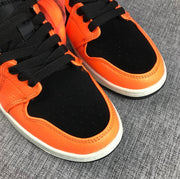 Jordan Air Jordan 1 Mid Orange Black Sneakers