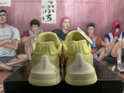 Nike Yellow Basketball Sneakers with Navy and Red Accents