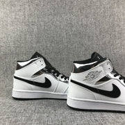 Jordan Air Jordan 1 Mid White Black Metallic Silver Sneakers