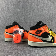 Jordan Air Jordan 1 Mid Orange Black Sneakers