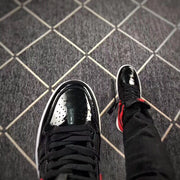 Jordan 1 High Black Red Patent Leather Sneakers