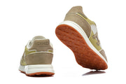 Hermès Trail Sneaker in Taupe, White and Olive
