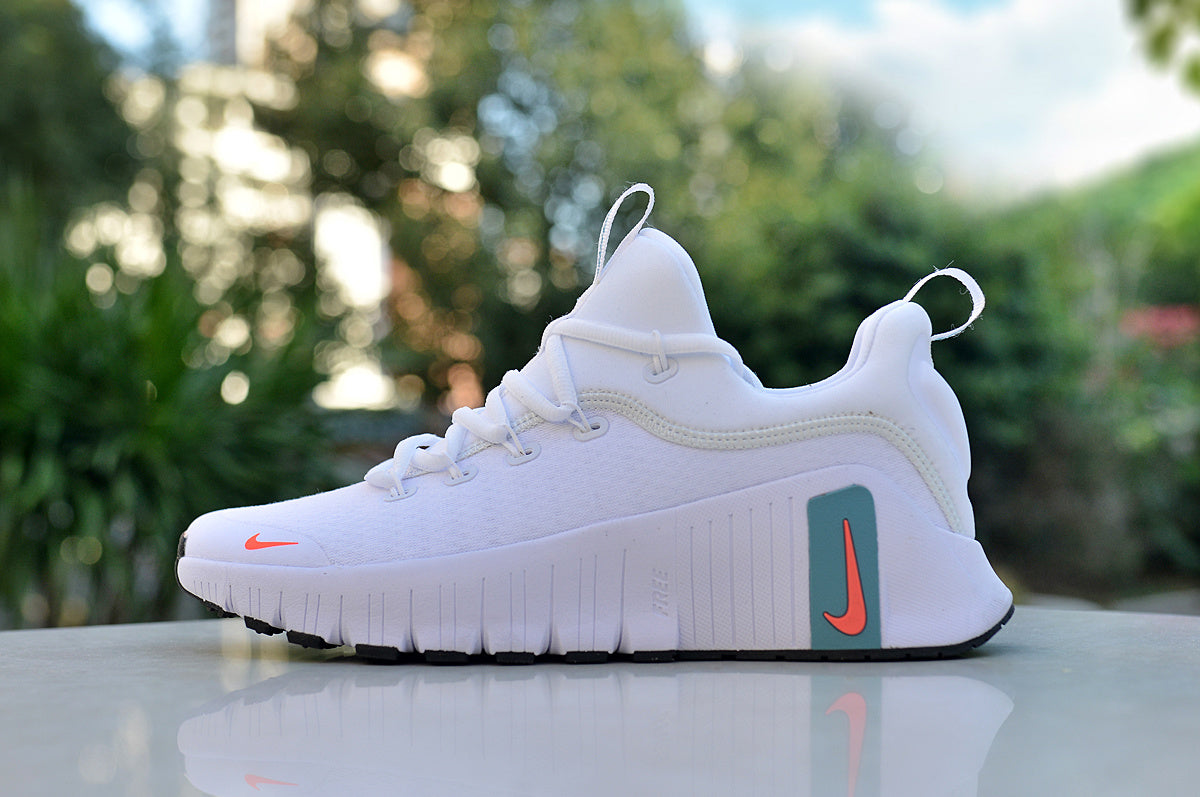 Nike White Low-Top Sneakers with Teal and Coral Accents