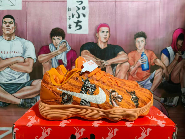 Nike Orange Basketball Sneakers with Animal Graphics