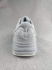 700 Gray and Coral Low-Top Sneakers