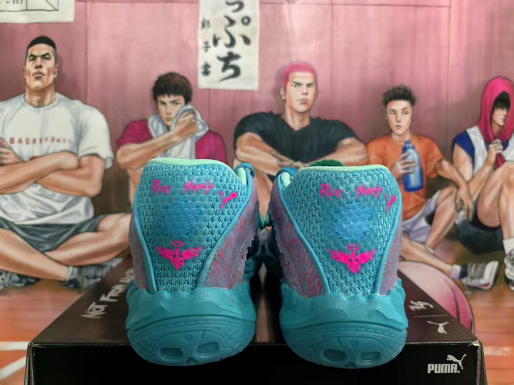 PUMA Blue Basketball Shoes with Pink Accents