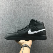 Jordan Air Jordan 1 Mid Black White 554724-049 Sneakers