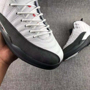 Jordan Air Jordan 12 Reverse Taxi Sneakers White Black