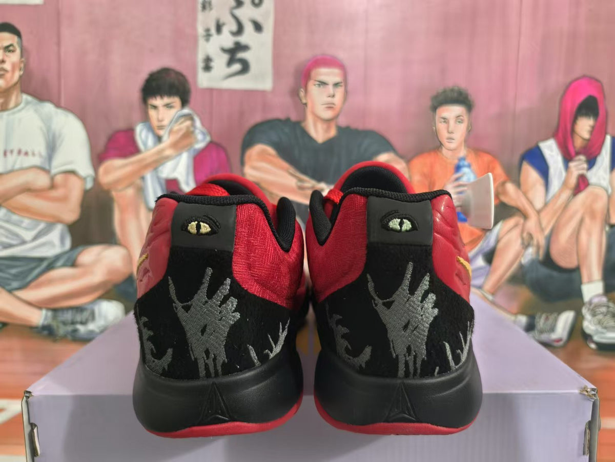 Nike Red and Black Basketball Sneakers with Gold Swoosh
