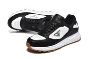 Prada Black and White Low-Top Sneakers with Gum Sole