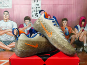 Nike Beige Basketball Sneakers with Orange and Blue Details