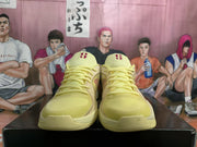Nike Yellow Basketball Sneakers with Navy and Red Accents
