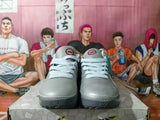 Nike Gray Low-Top Sneakers with Metallic Swoosh