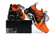 Nike Air Max Plus Sneakers in Orange and Black