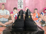 Nike Black and Gold Basketball Sneakers