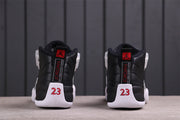 Jordan Air Jordan 12 Reverse Taxi Sneakers Black White 130690-001