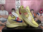 Nike Yellow Basketball Sneakers with Navy and Red Accents