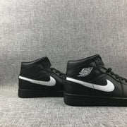 Jordan Air Jordan 1 Mid Black White 554724-049 Sneakers