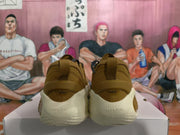 Gold Low-Top Sneakers with Lace-Up Design