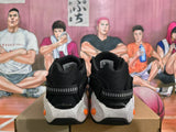 Nike Black Basketball Sneakers with Orange and Blue Accents