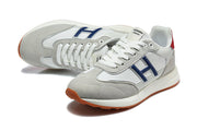 Hermès Grey and White Low-Top Sneakers with Blue Accents