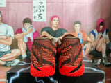 Nike Red Basketball Sneakers with Black and Orange Details