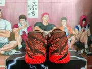 Nike Red Basketball Sneakers with Black and Orange Details