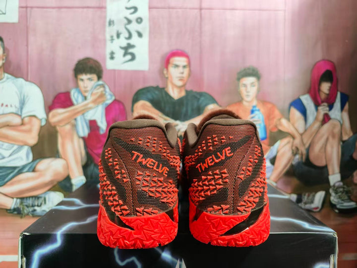 Nike Red Basketball Sneakers with Black and Orange Details