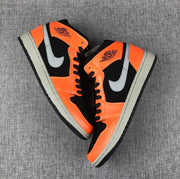 Air Jordan 1 Mid Sneakers in Black, Orange and Grey 554724-062