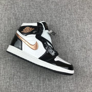 Jordan Air Jordan 1 Mid Sneakers Black White Gold 852542-007