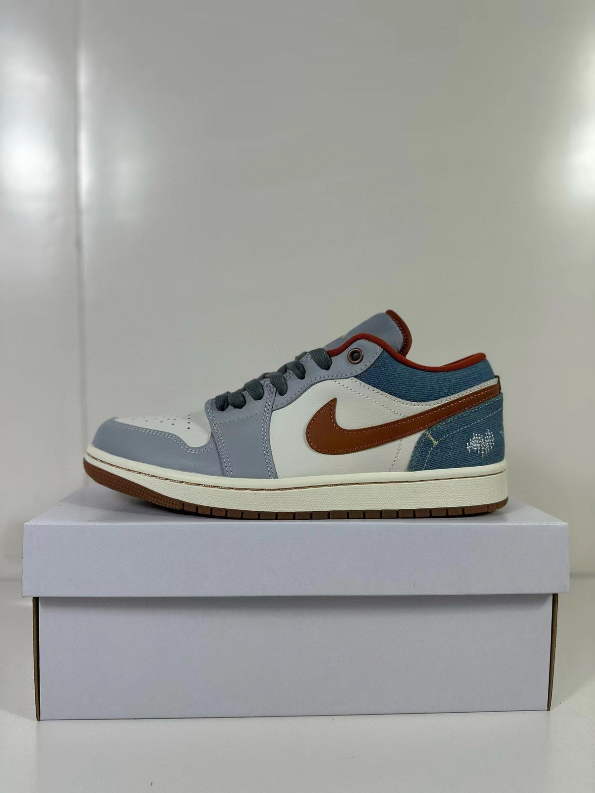 Jordan Air Jordan 1 Low Sneakers Blue Gray and Brown FZ5045-019